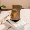 Human Faced Copper Statue
