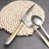 gold and steel cutlery