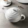 White ceramic teapot