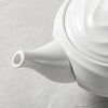 White ceramic teapot