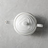 White ceramic teapot