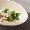 Oval light brown bowl