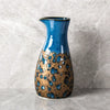 blue and gold flask