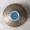 gold and blue bowl
