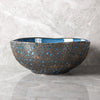 gold and blue bowl