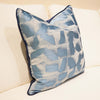 Sky Blue and Cream Colored Cushion