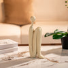 White Sitting Character Sculpture