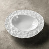 white unique soup plate