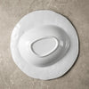 white unique soup plate