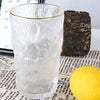 gold rimmed frosted glass