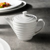 white ceramic coffee pot