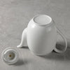 White oval coffee pot