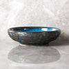 small shallow blue bowl