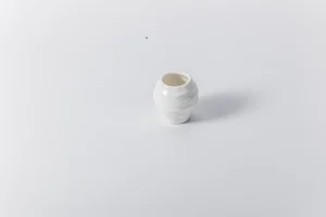 white ceramic toothpick holder