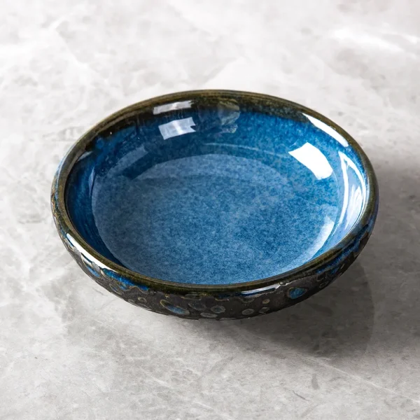 small shallow blue bowl