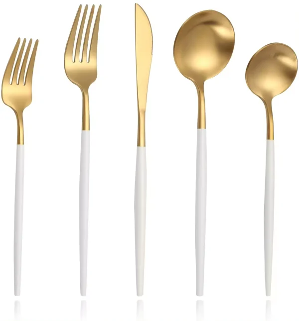 white and gold cutlery